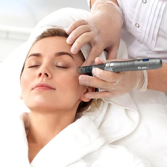 Person receiving microneedling